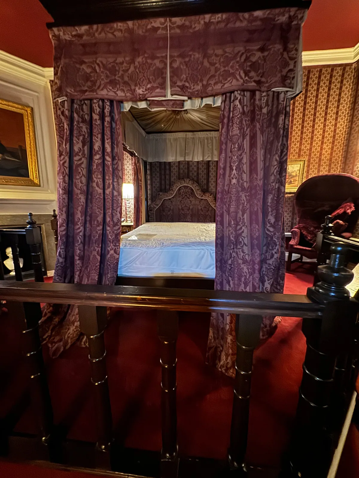 Decorative bed curtains and heritage fabrics inside Lumley Castle