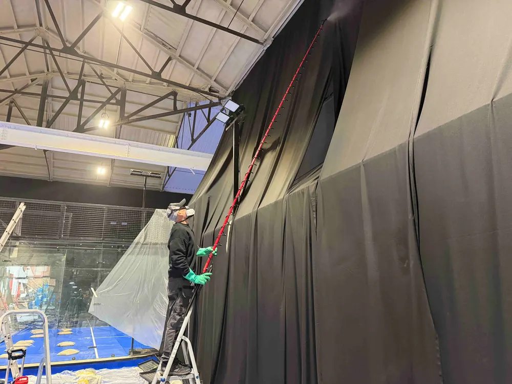 Professional fire retardant treatment for theatre curtains